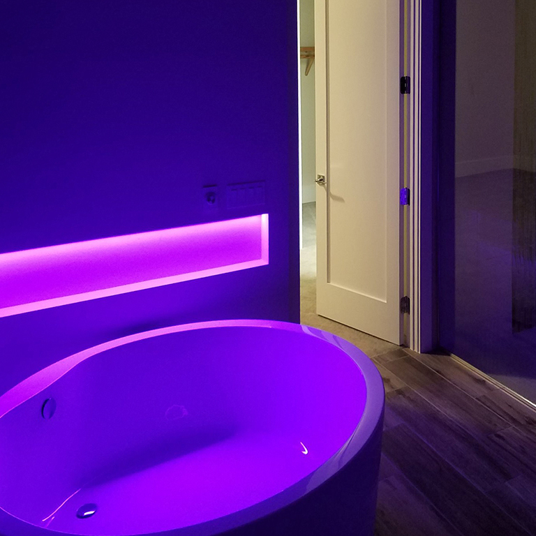 cove bathroom rgb lights led strips Bathroom niche and bathtub illuminated by purple RGB light