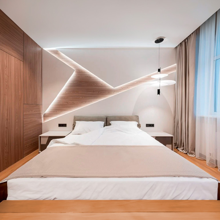 hotel-room-with-main-wall-decorated-with-cold-lights Hotel room with a main wall artistically lit using white LED strips