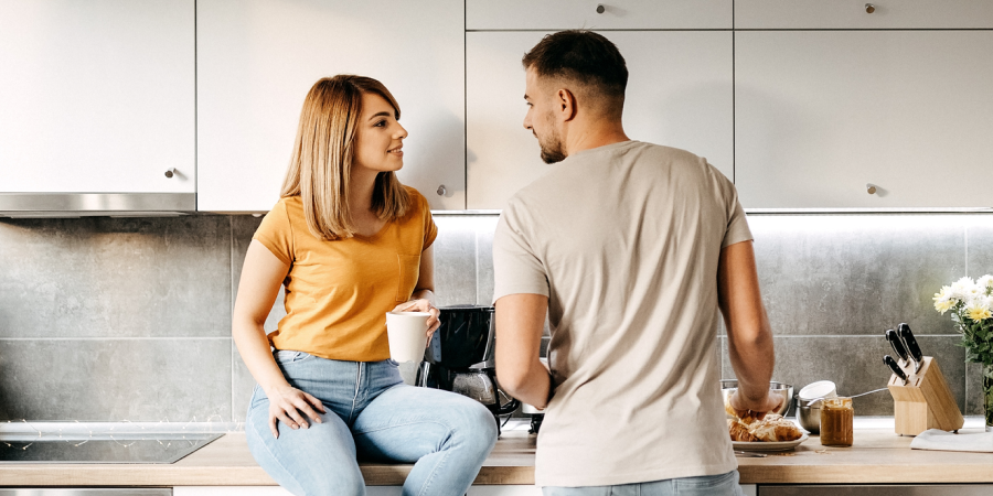 Couple in Kitchen with Under-Cabinet Lights ”Couple