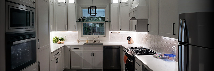 white-kitchen-with-under-cabinet-strip-lights Modern kitchen with white under cabinets strip lights